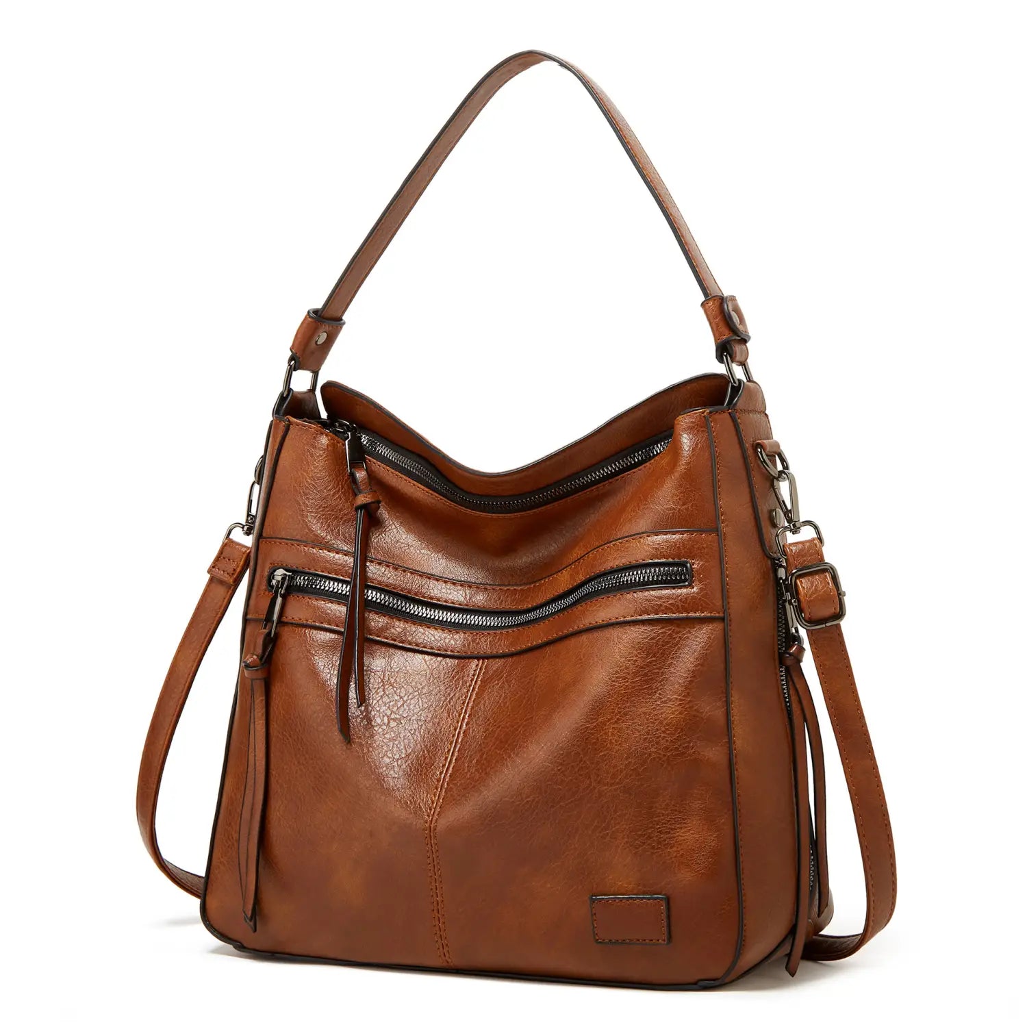 Braune Lederschultertasche mit mehreren Reißverschlussfächern und verstellbarem Riemen, gestaltet als Multi-Reißverschluss-Crossbody-Tote.