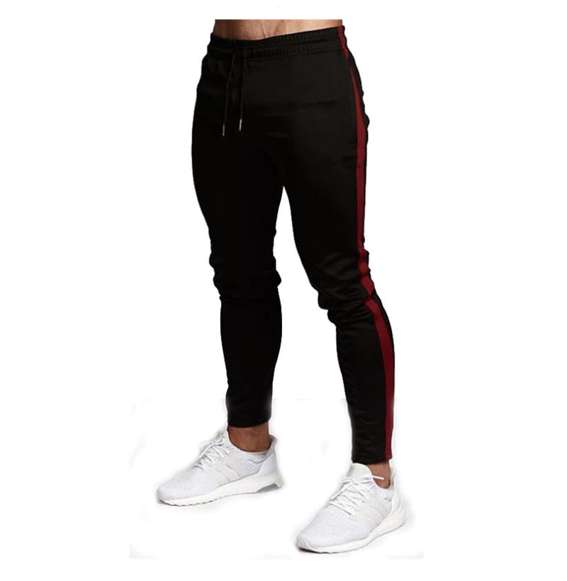 black slim fit athletic joggers made of cotton featuring red side stripes designed for sports use