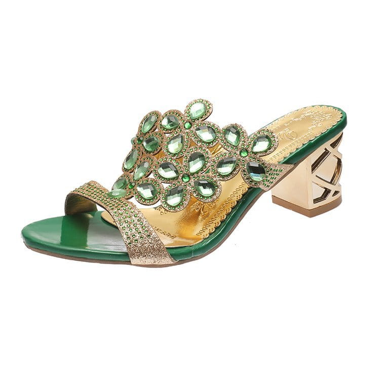 Green and gold embellished peacock feather design rhinestone high heel mule sandals with a block heel.