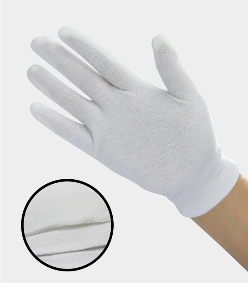 men’s white cotton work glove with reinforced fingertips showing a snug fit and reinforced wrist cuff on the back side