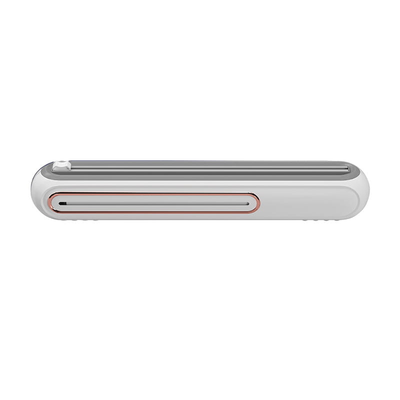white and silver magnetic cling film cutter and plastic wrap dispenser with a minimalist design featuring a rose gold accent around the slot