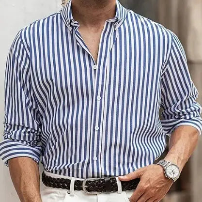 Blue and white vertically striped cotton button down shirt for men with long sleeves rolled up for a casual look.