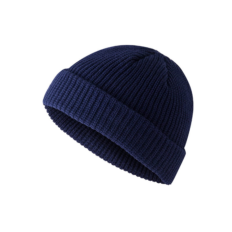 Navy blue ribbed knit beanie with a folded cuff displayed as the back side of the dark gray ribbed wool beanie hat product.