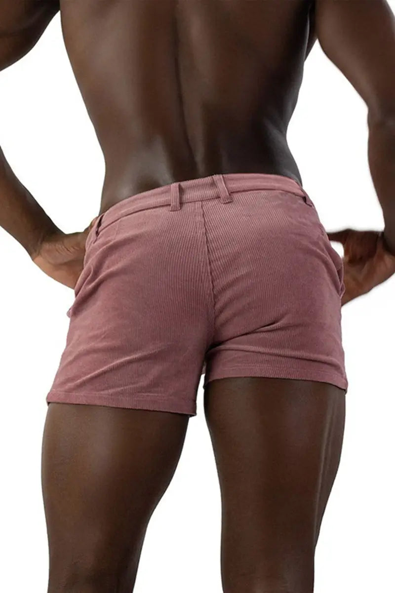 Men corduroy beach shorts in pink featuring a classic belt loop design and casual mid rise style.