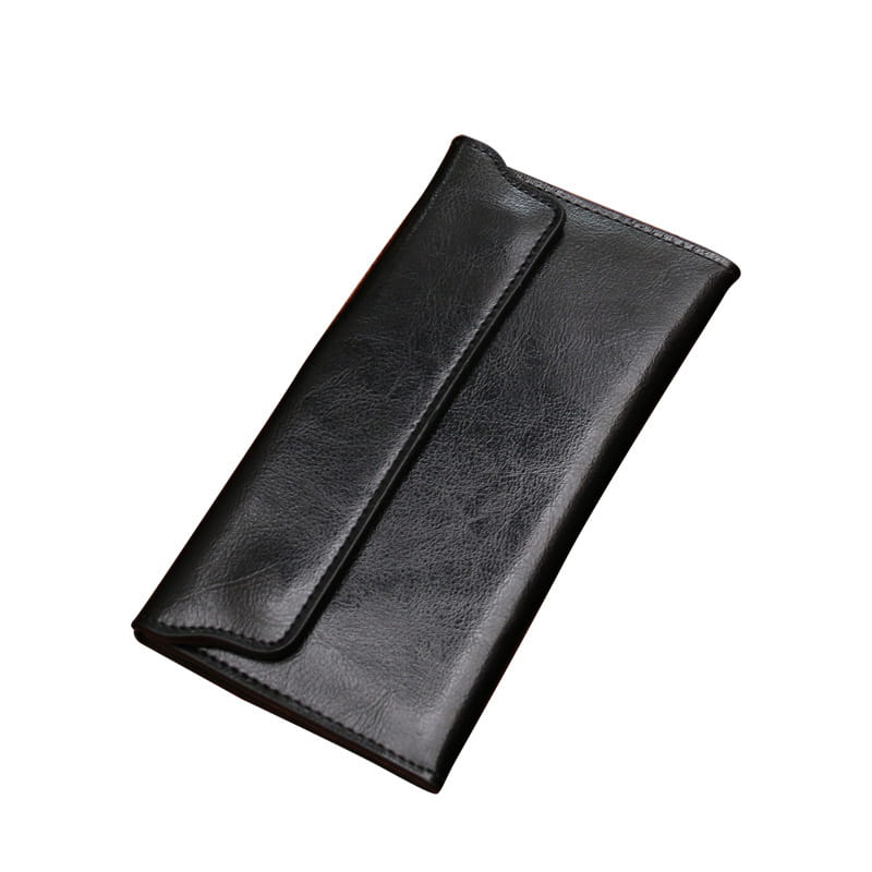 Black leather long wallet made of cowhide leather with a smooth slightly textured surface and contrast stitching along the edges.
