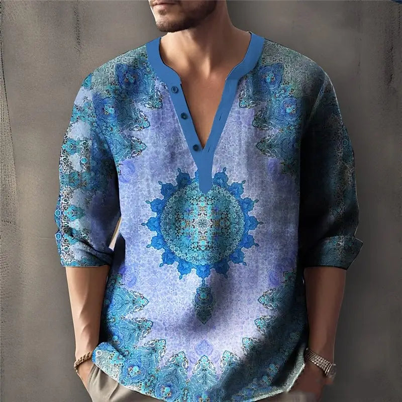 Un hombre que viste una camisa de lino para hombre con cuello en V y estampado de mandala en azul y morado, con mangas tres cuartos y un diseño abotonado.