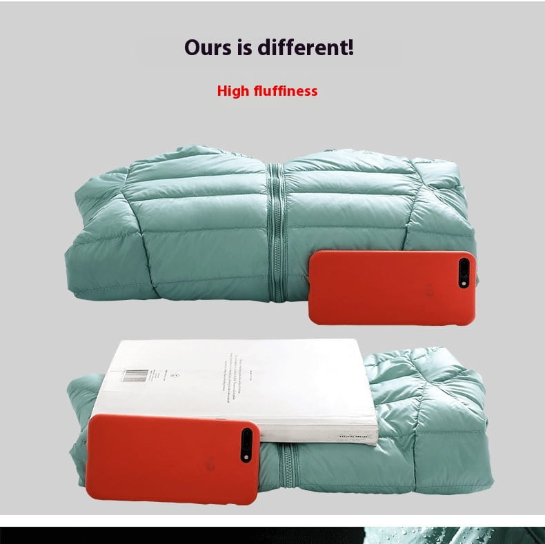A light teal women lightweight down hooded puffer jacket with quilted design, central zipper, and high fluffiness.