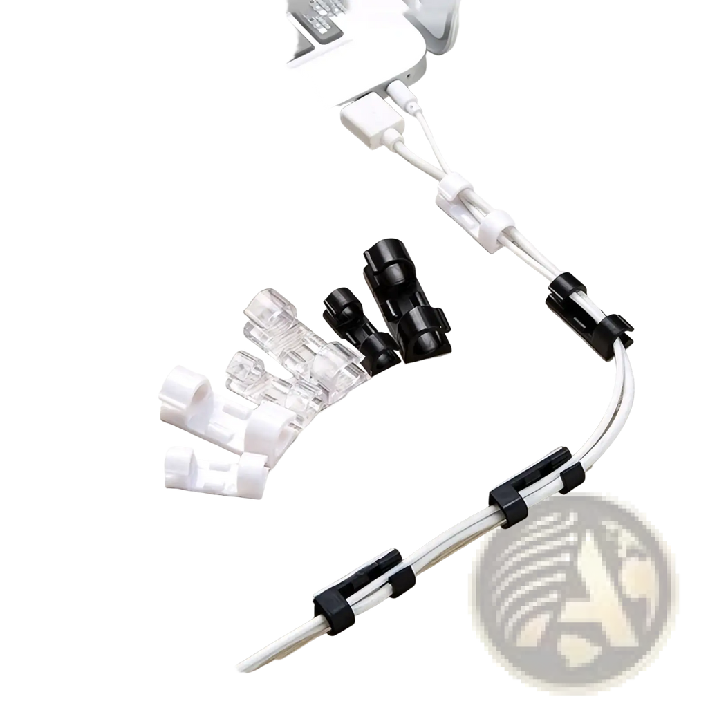 Black and clear plastic cable organizer clips neatly managing white usb cables on desk beside laptop for cord management