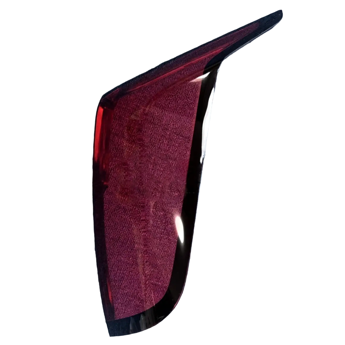 Back side of a glossy deep red cadillac ct6 rear taillight cover 2019-2022 with sleek angular design and black trim