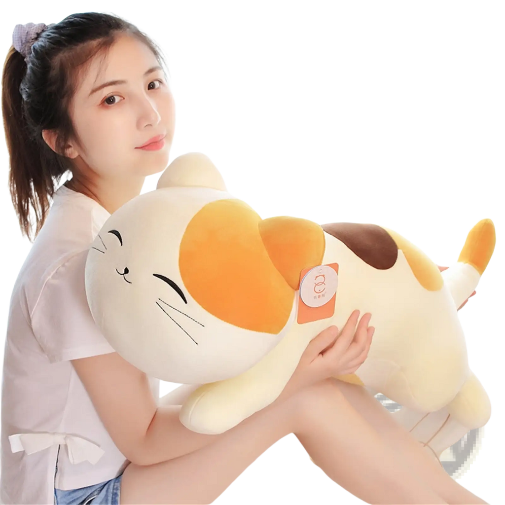 Calico cat plush toy large smiling stuffed animal with cream fur and orange and brown patches soft and cuddly