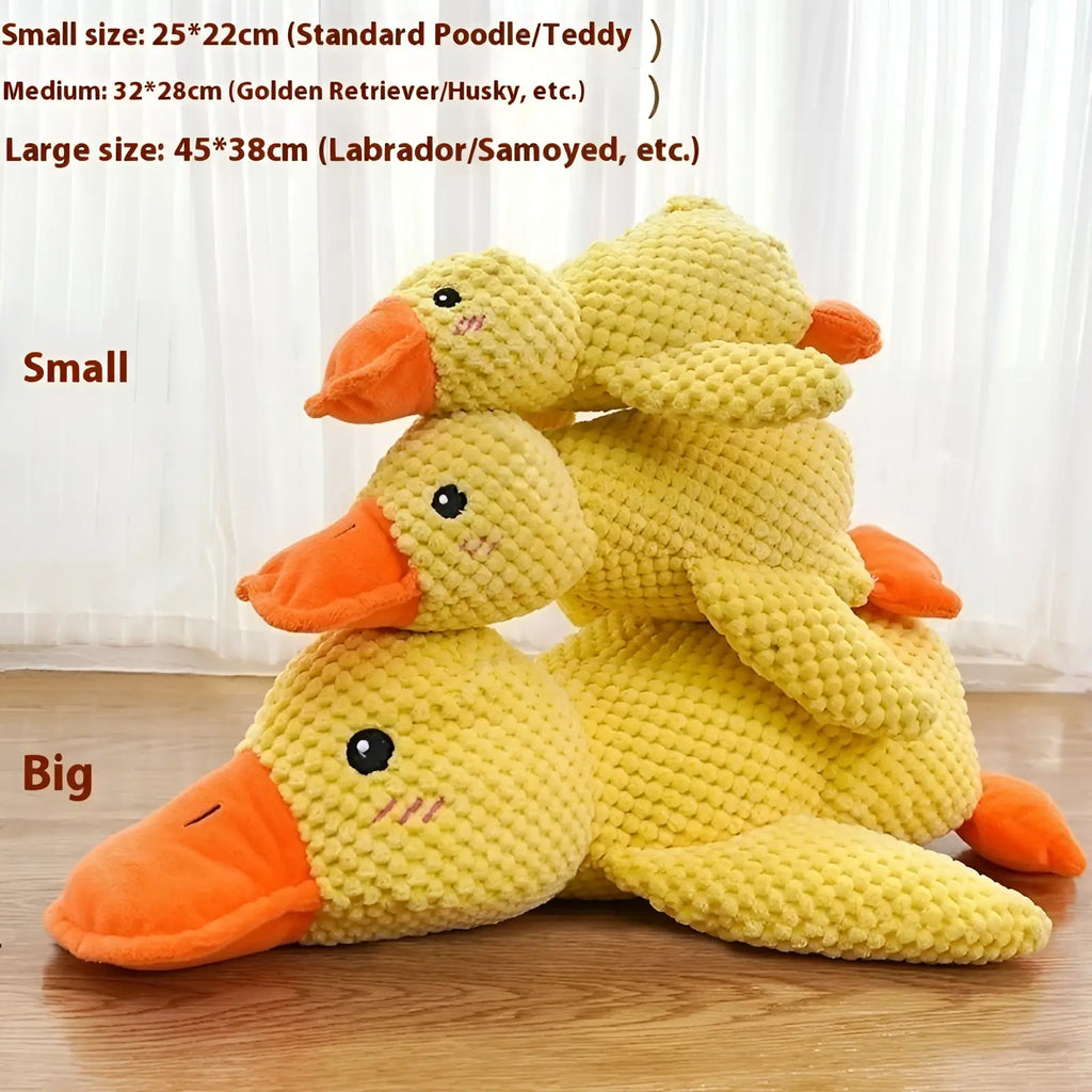 Yellow corduroy calming duck toy with orange beak and feet designed for dogs anxiety relief and play