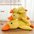 Yellow corduroy calming duck toy with orange beak and feet designed for dogs anxiety relief and play