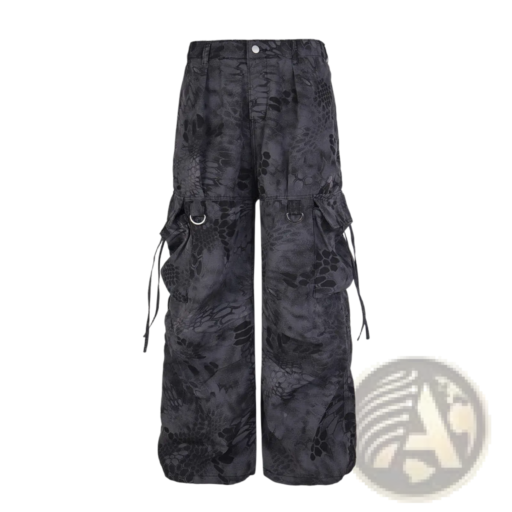 Black cargo pants with dark gray snake-scale camouflage pattern, multiple pockets, and adjustable side ties for tactical use