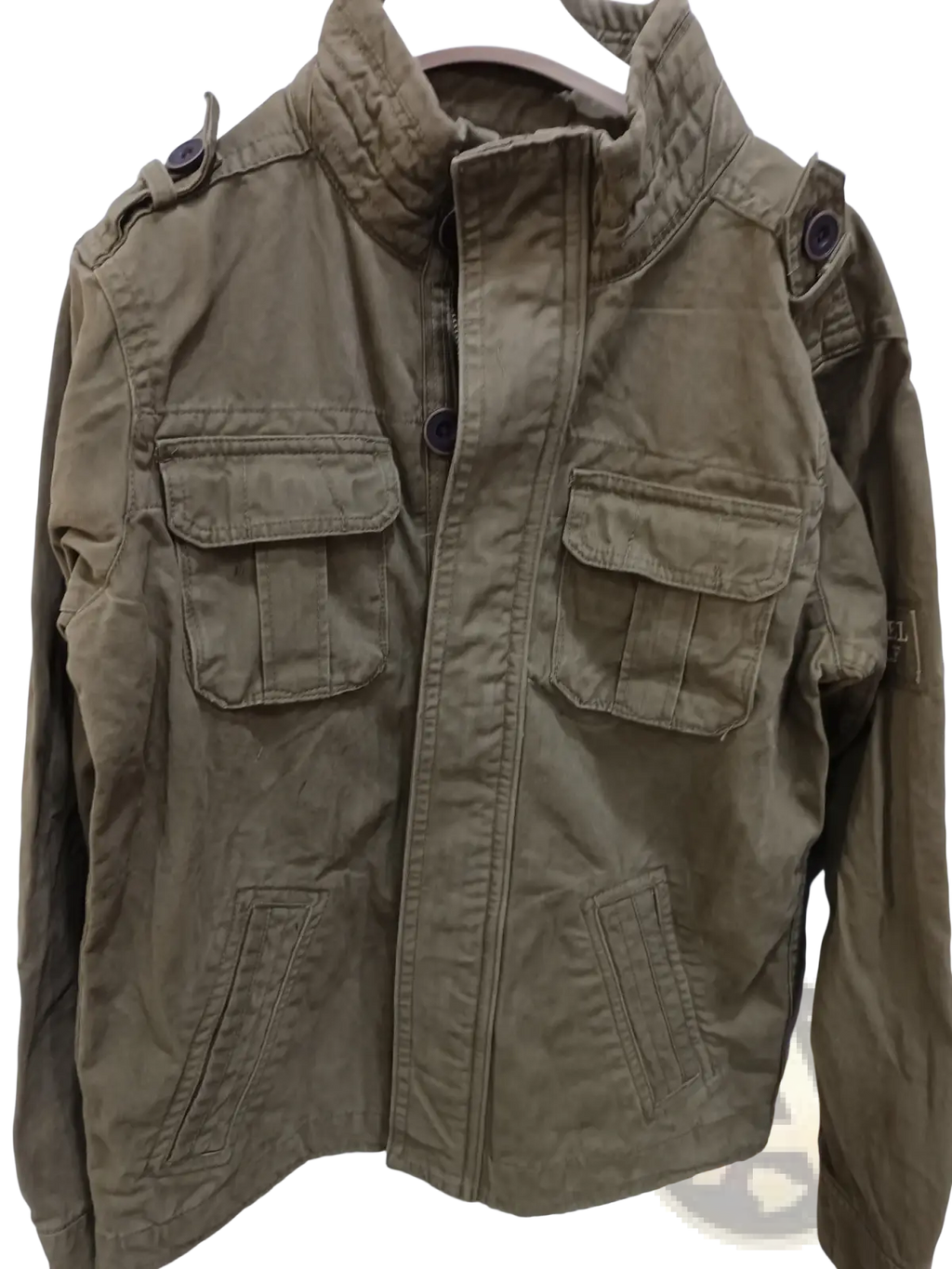 Olive green cotton utility jacket with multiple flap pockets and buttoned epaulets camouflage military style