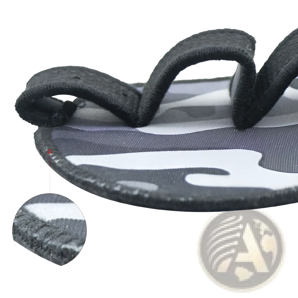 Black and white camouflage patterned flip-flop with textured fabric straps for casual summer wear