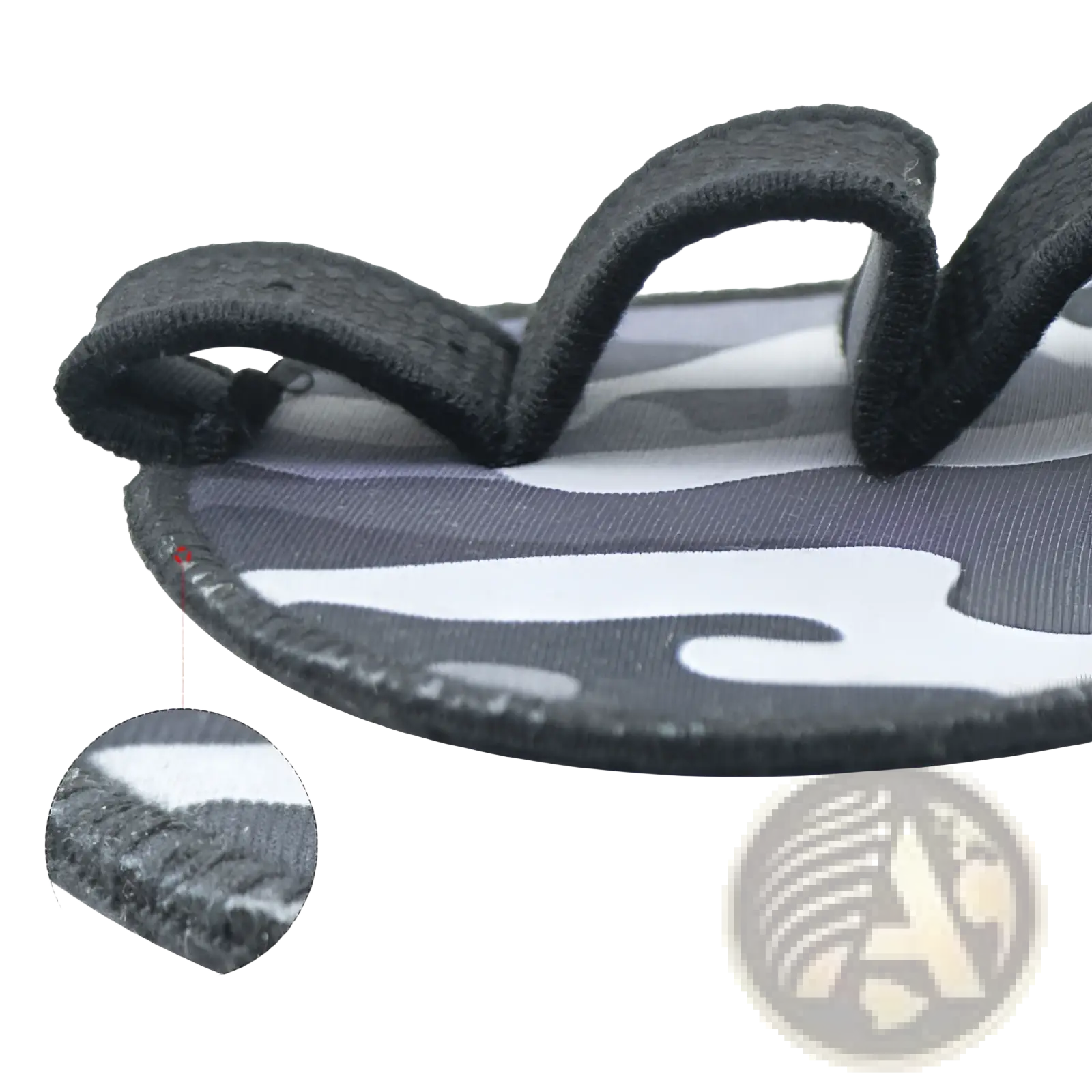 Black and white camouflage patterned flip-flop with textured fabric straps for casual summer wear
