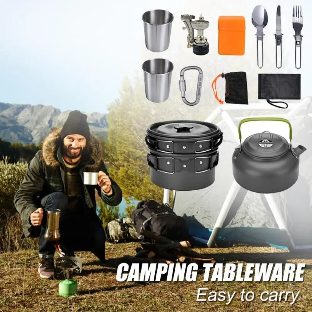 Black stacked aluminum camping pot with green handle and silver carabiner from cookware set with kettle and utensils