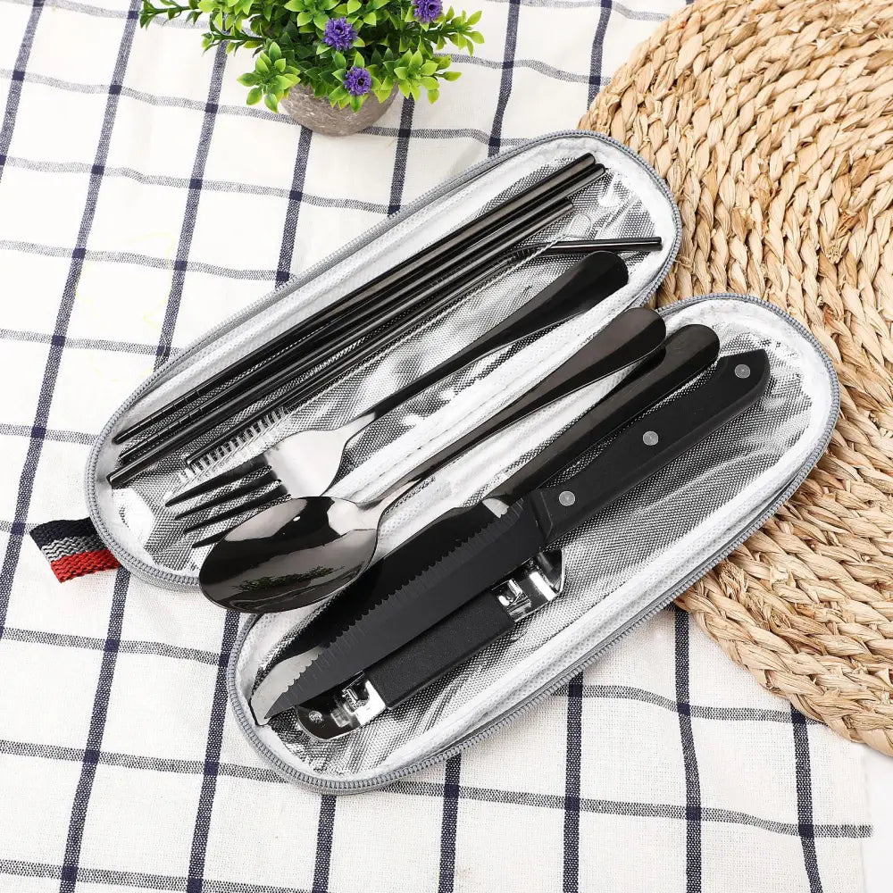 9-piece black and silver stainless steel camping cutlery set with travel case in a sleek oval shape for portability
