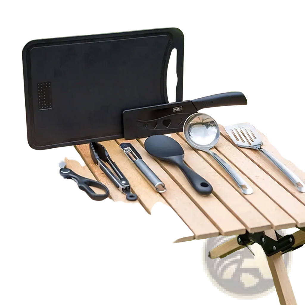 Black plastic camping kitchenware set with integrated cutting board and stainless steel utensils for outdoor use