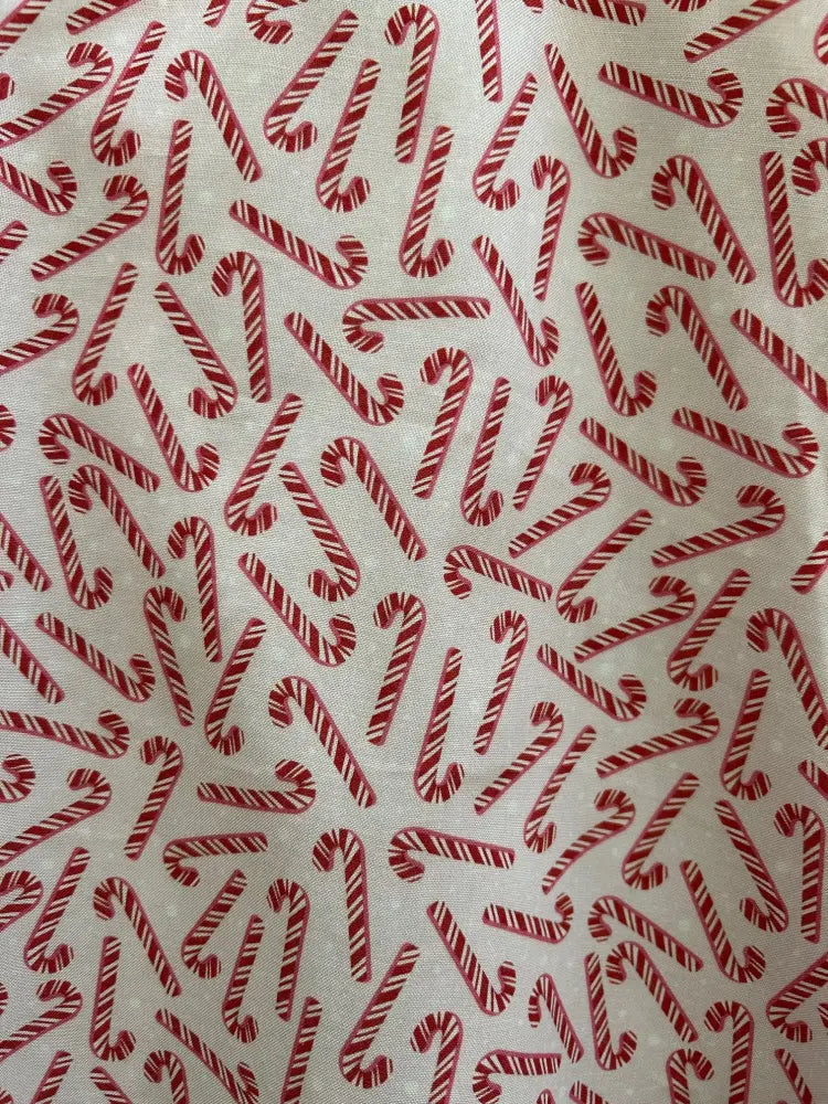 Candy cane stripe a-line skater dress with pockets featuring red and white striped candy cane patterned fabric