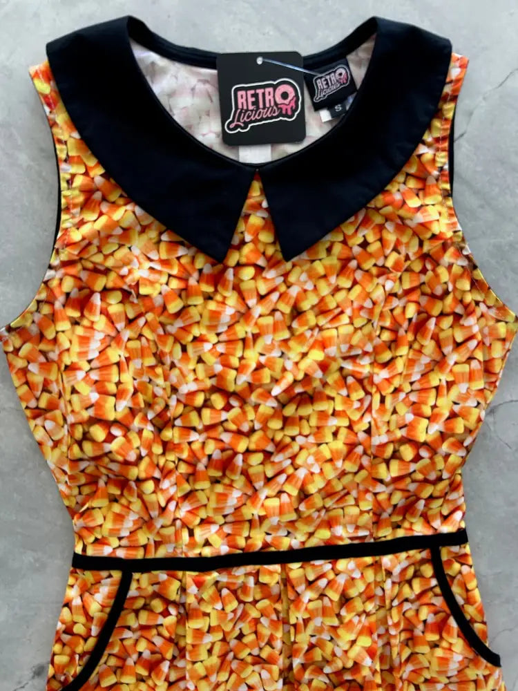 Retro candy corn sleeveless cotton a-line dress with black peter pan collar and waistband in orange yellow and white