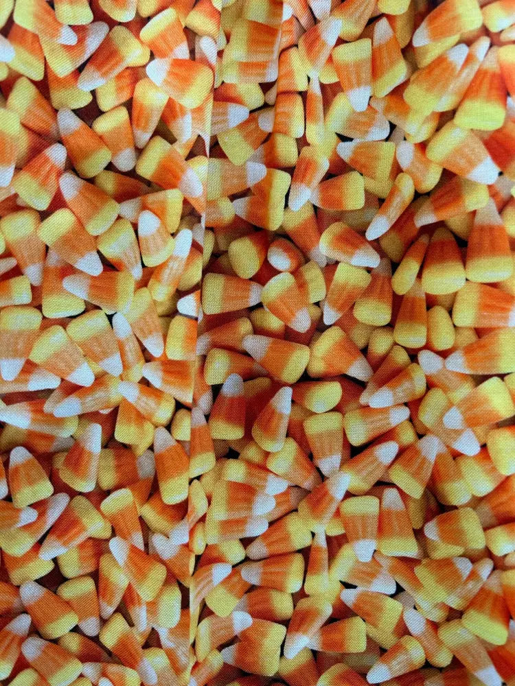 Retro candy corn peter pan collar cotton a-line dress with vibrant orange yellow and white striped fabric pattern