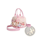 Pink checkered canvas dog handbag with cartoon puppy and star design featuring matching pink handles and strap