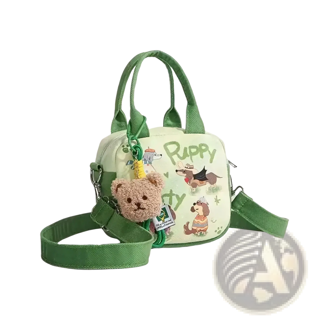 A soft mint green canvas dog handbag with playful puppy illustrations and a plush teddy bear charm