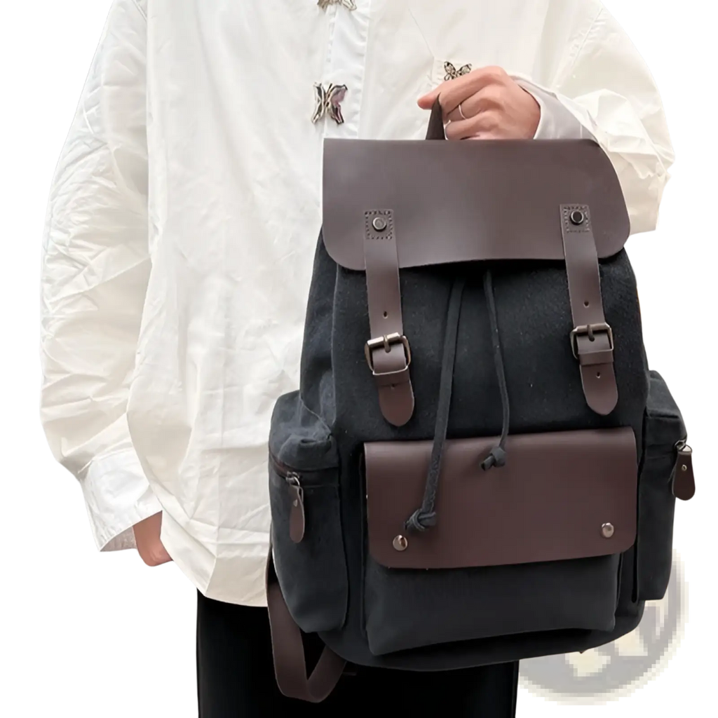 Dark gray canvas retro backpack with brown leather accents and metal buckles large capacity wear resistant design