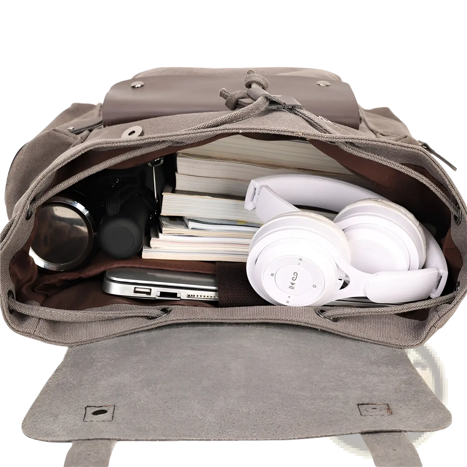 Gray canvas retro backpack with large capacity, drawstring closure, leather flap, filled with books and tech gear