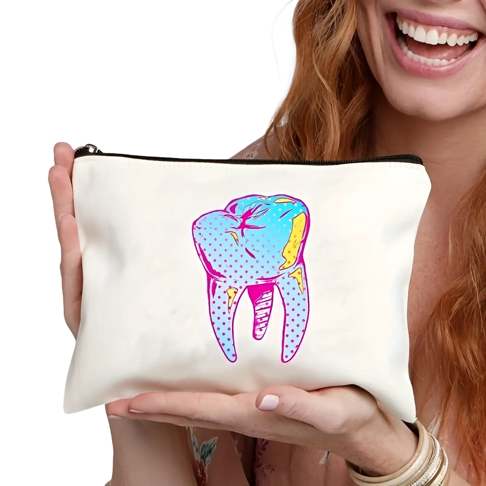 White canvas zipper pouch with vibrant blue pink and yellow stylized tooth and polka dot detailing for travel use