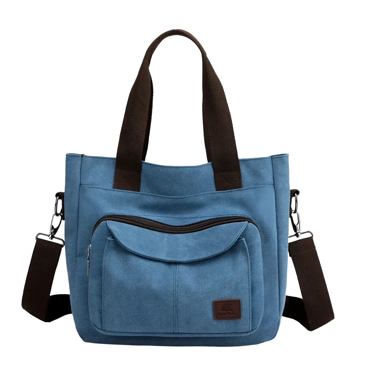 Blue canvas tote bag with brown fabric handles and shoulder strap featuring front zippered pocket and small leather patch