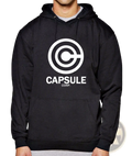 Black hoodie featuring a white circular capsule corp logo for hip hop streetwear and casual wear