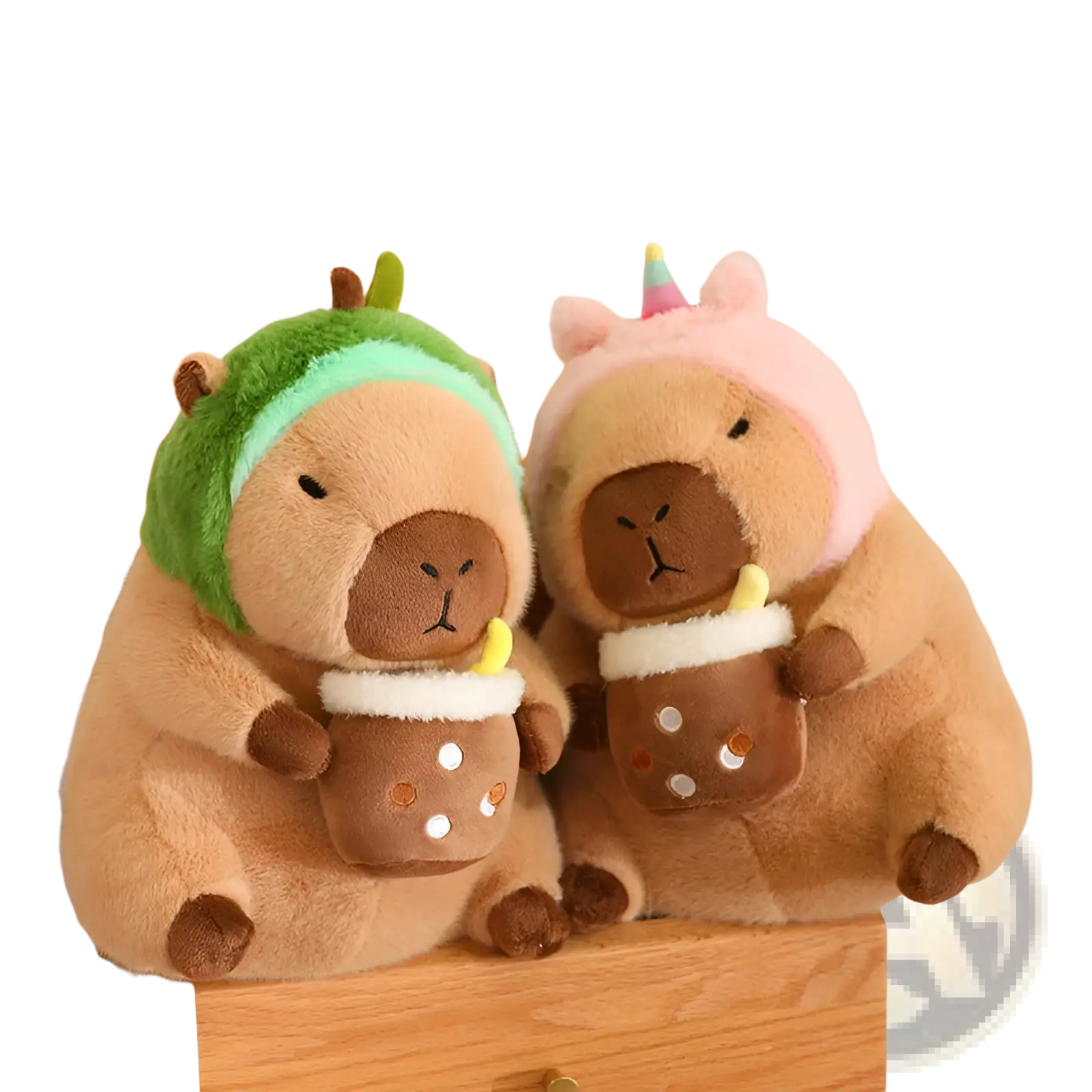 Two plush capybara toys in bread and flower outfits holding brown cups with white polka dots