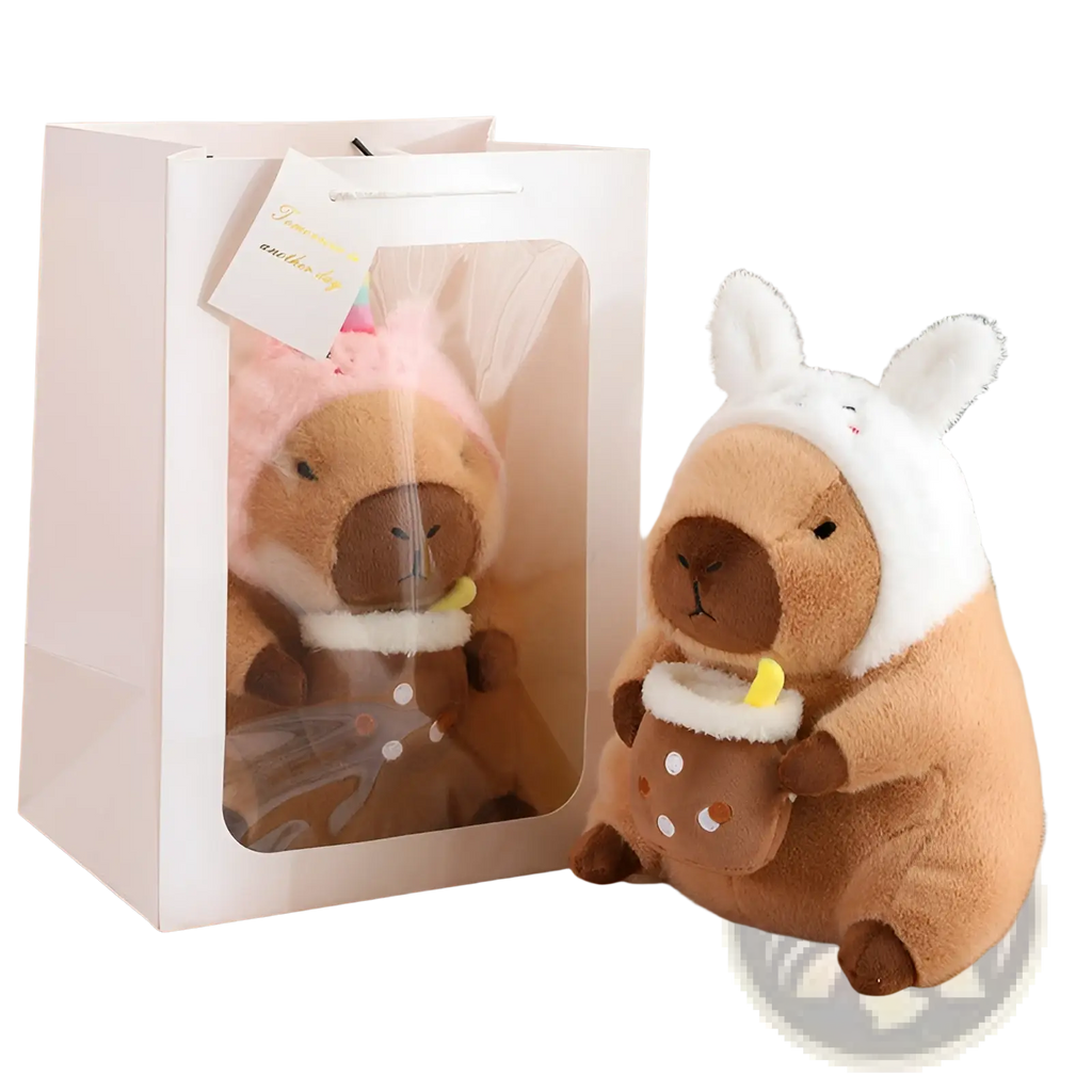 Capybara plush toy wearing a white bunny hat and holding a small brown polka dot cup in bread and flower outfits