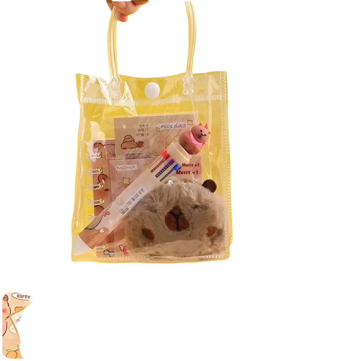 Clear plastic gift bag with transparent handles containing a plush capybara and kawaii stationery set for students