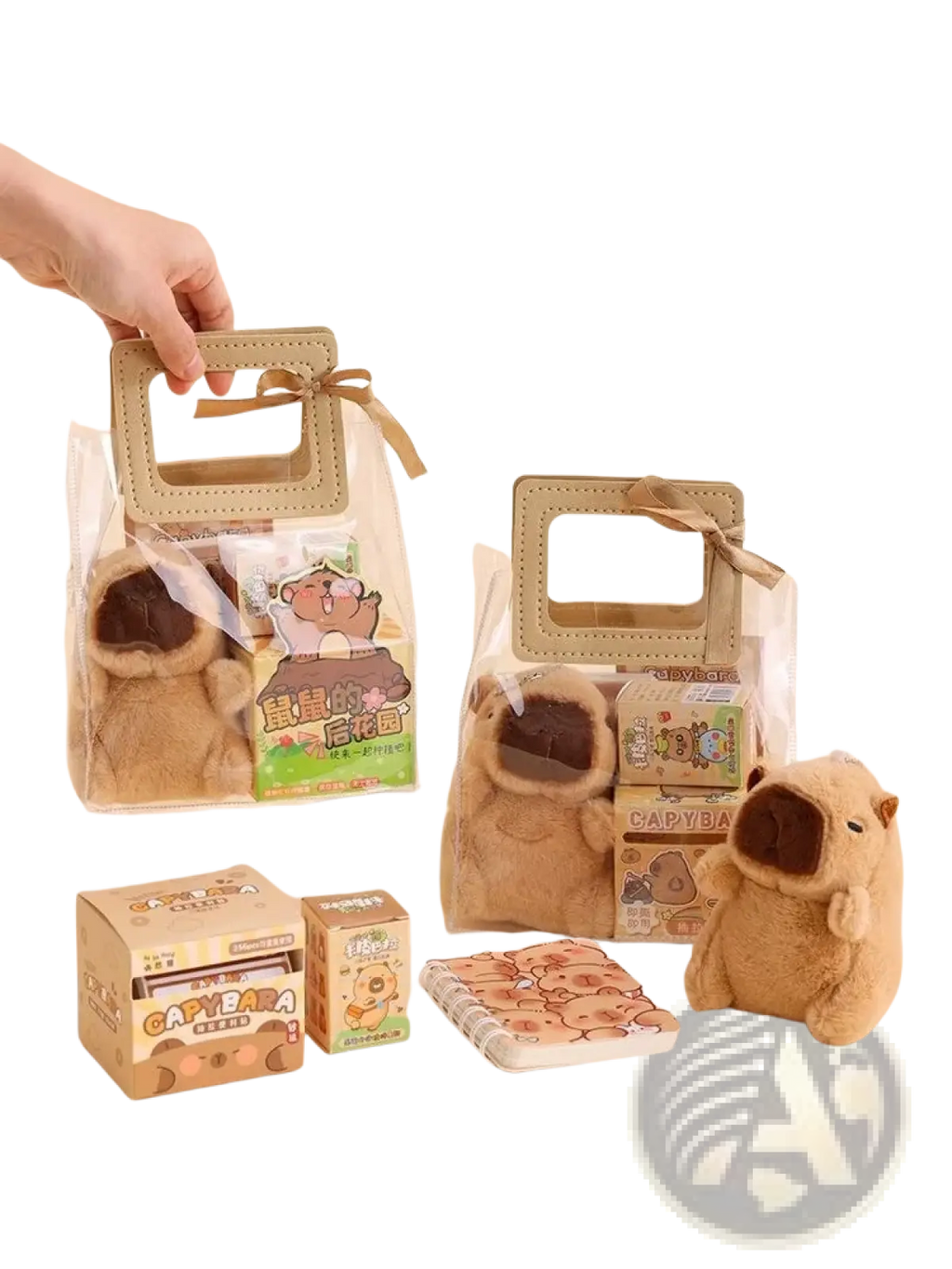 A plush tan capybara-shaped keychain with soft fuzzy texture and dark brown snout in capybara stationery set