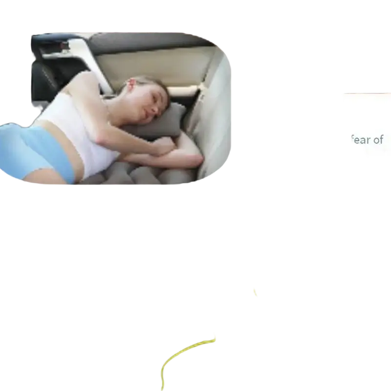 Gray inflatable car bed with wavy tufted design and yellow stitching for comfortable travel in backseat