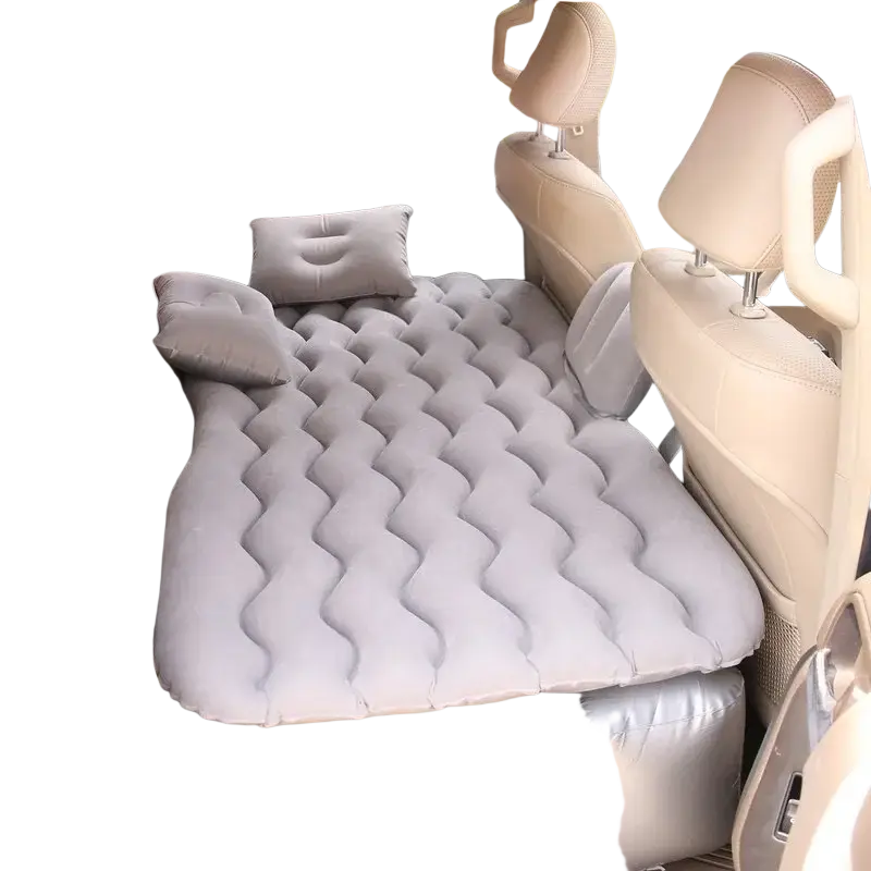 Gray inflatable car bed air mattress with quilted wavy pattern and two matching pillows for backseat use