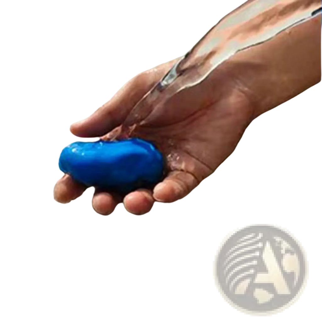 A vibrant blue smooth oval-shaped car clay bar being rinsed as part of a 3 pack detailing mud cleaner set