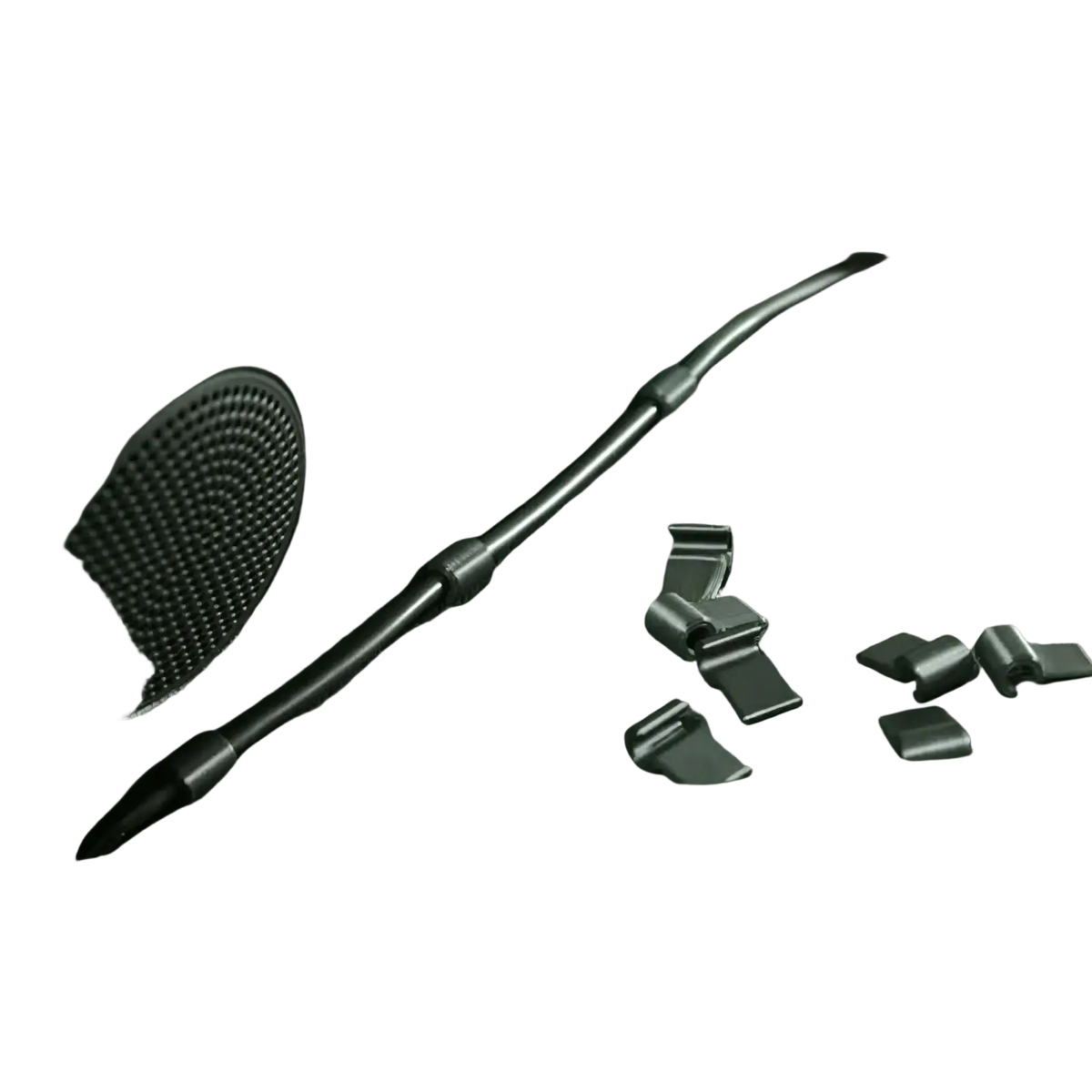 Black plastic car dashboard cable clips and interlocking wire organizers scattered next to an installed tie