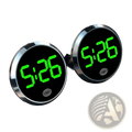 Two circular car dashboard digital clocks with bright green led displays and chrome-finished bezels showing 5 26