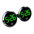 Two circular car dashboard digital clocks with bright green led displays and chrome-finished bezels showing 5 26