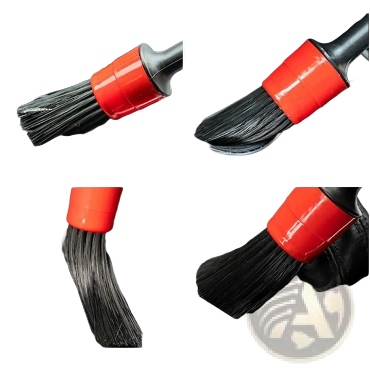 Red-handled car detailing brush with black bristles for cleaning and polishing vehicles