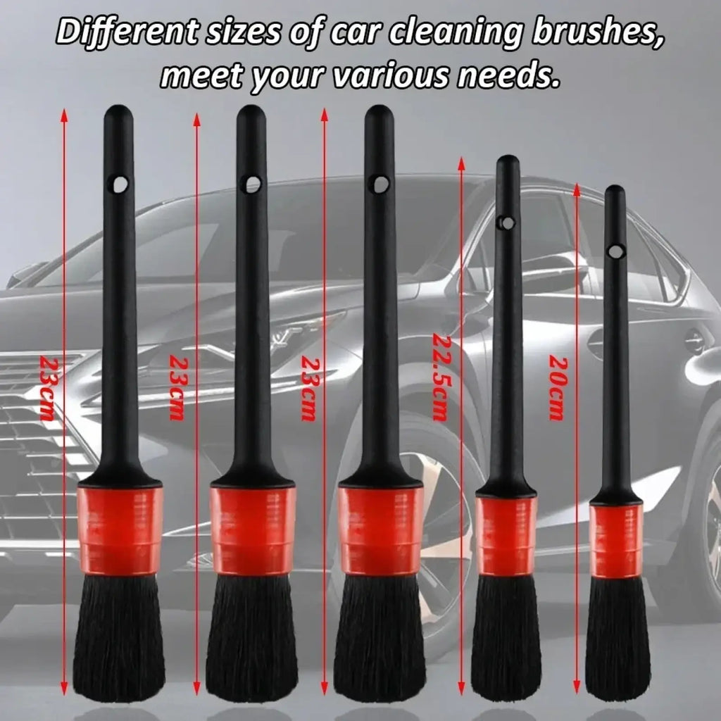 Set of five black and red car detailing brushes with sturdy handles and dense bristles for precise cleaning and polishing