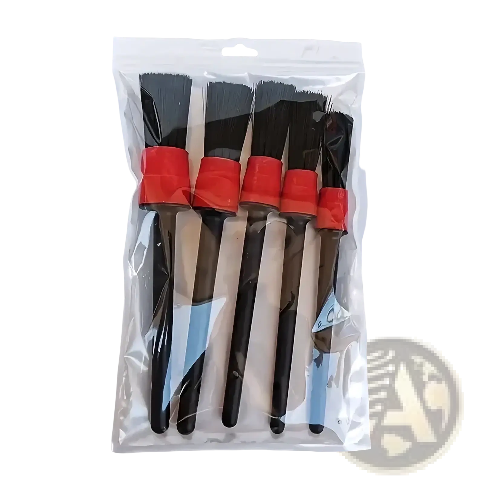 Set of five black nylon bristled car detailing brushes with red plastic handles in clear plastic packaging