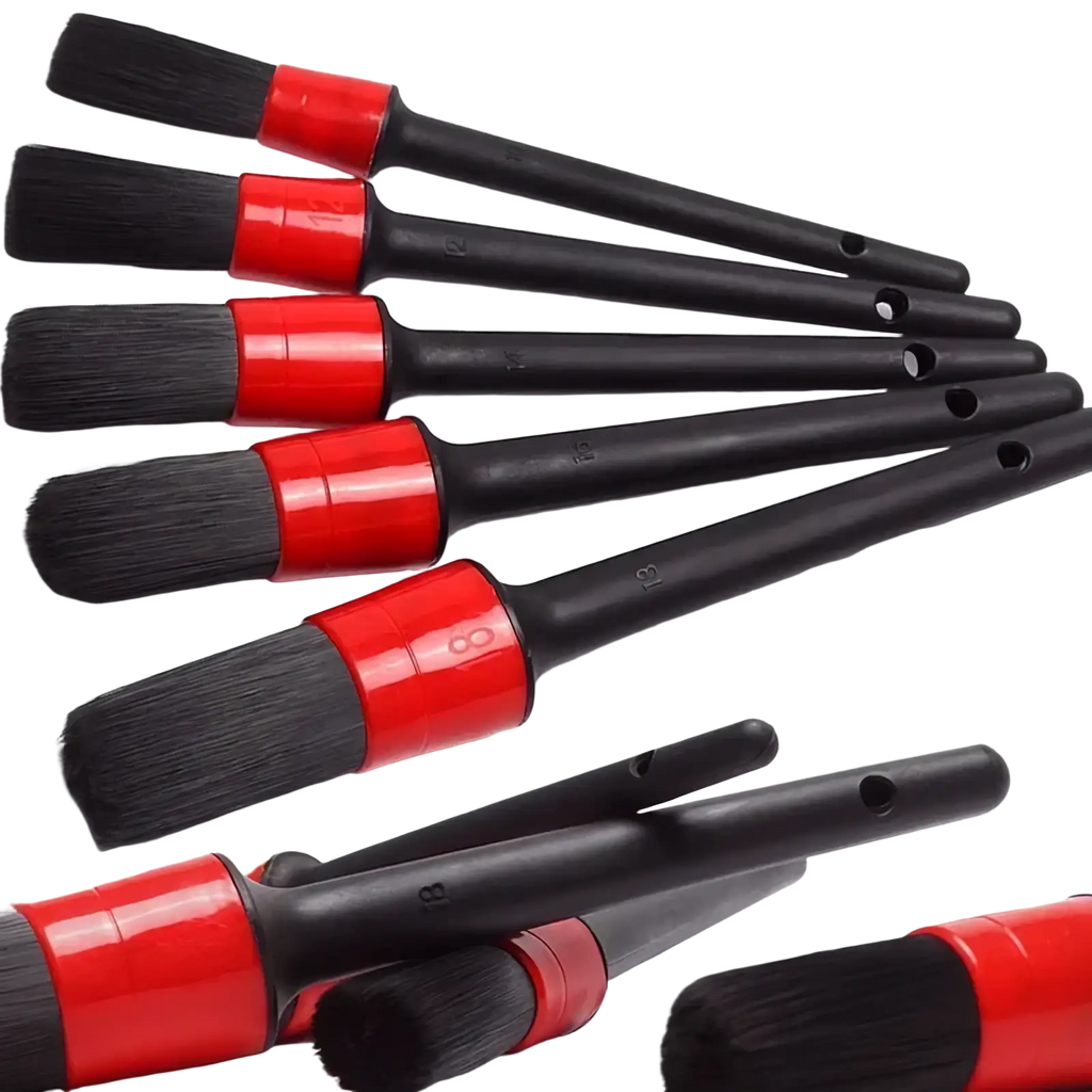 Set of five black and red car detailing brushes with red handles and numbered sizes for precise cleaning