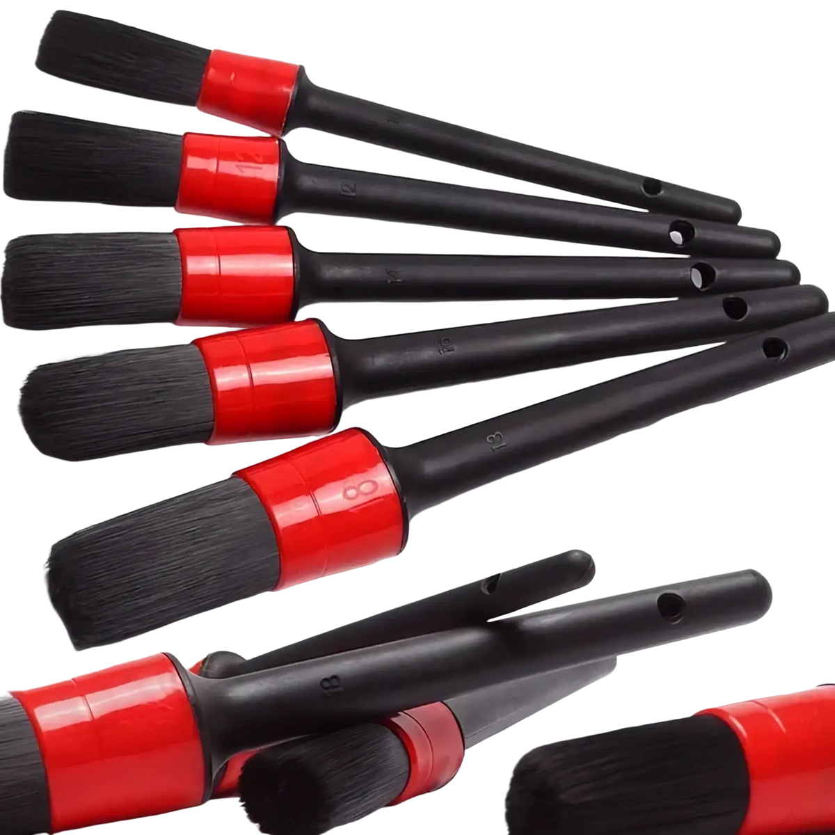 Set of five black and red car detailing brushes with red handles and numbered sizes for precise cleaning