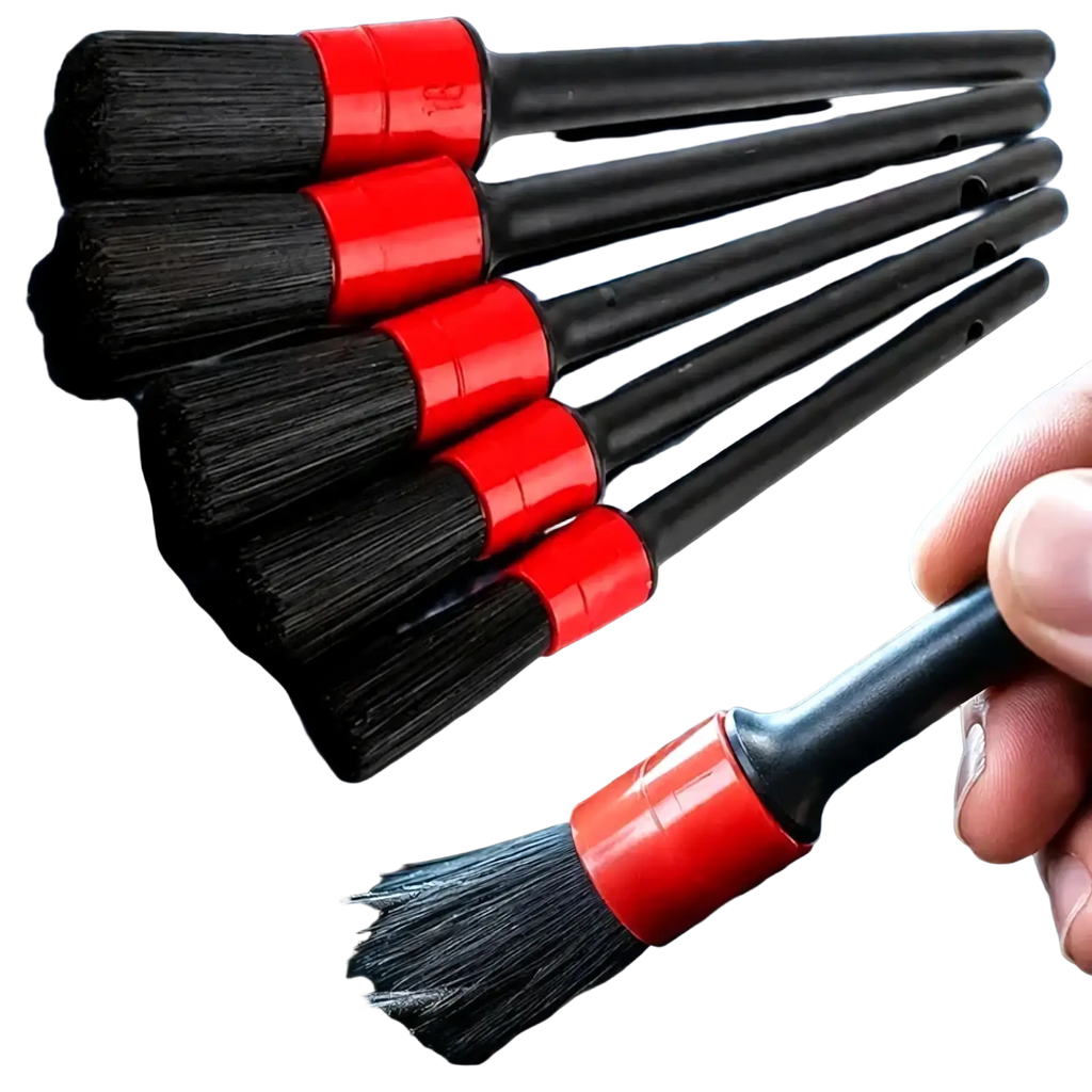 Set of black bristle car detailing brushes with red plastic handles for precise cleaning in a 5-piece brush set