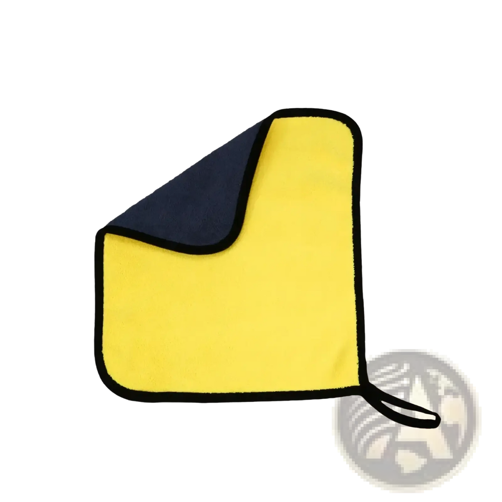 Bright yellow microfiber car detailing cloth with navy blue underside and looped handle for easy carrying in auto cleaning kit